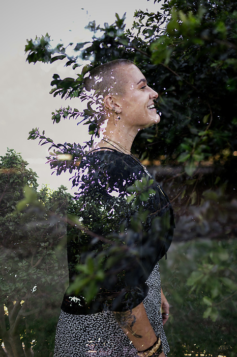 Portrait of Non Binary Person with Shaved Head in San Diego, by Cavan Images / Jill Denny Soto