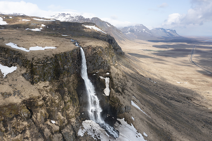 Bjarnarfoss waterfall from aerial view in winter, by Cavan Images / Néstor Rodan