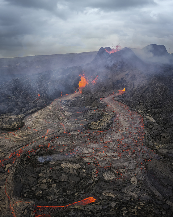 volcano erupting from aerial point of view, by Cavan Images / Néstor Rodan