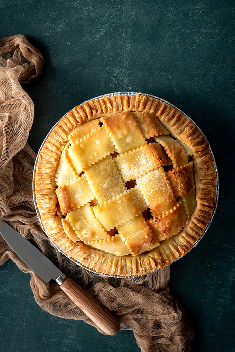 Simple pie photo with knife, by Cavan Images / Lauren K. Stein