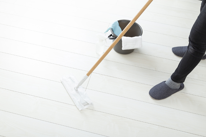 Woman cleaning flooring