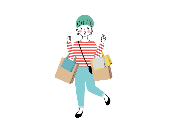 Smiling woman with lots of shopping