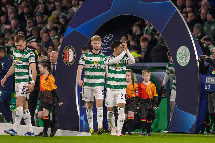 Celtic v Feyenoord Champions League 13 12 2023. Japanese Player Tomoki Iwata of Celtic FC applauds the fans as he comes out of the tunnel during the Champions League Matchday 6, Celtic FC vs Feyenoord, Celtic Park, Parkhead, Glasgow, 13 12 2023.