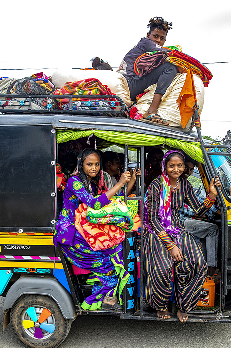 Young Indians in an autorickshaw near Dediapada, Gujarat, India, Asia Young Indians in an autorickshaw near Dediapada, Gujarat, India, Asia, by Godong