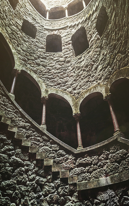 View of spiral staircases at the Initiation Well, purportedly used for ceremonial purposes by Freemasons in the 19th century, at Quinta da Regaleira, Sintra, Portugal, Europe View of spiral staircases at the Initiation Well, purportedly used for ceremonial purposes by Freemasons in the 19th century, at Quinta da Regaleira, Sintra, Portugal, Europe, by Alexandre Rotenberg