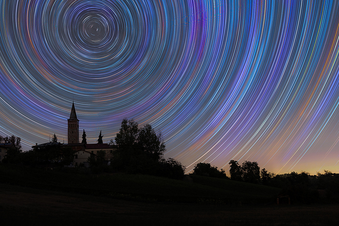 Concentric star trail over a bell tower in the Italian countryside, Emilia Romagna, Italy, Europe Concentric star trail over a bell tower in the Italian countryside, Emilia Romagna, Italy, Europe, by Francesco Fanti