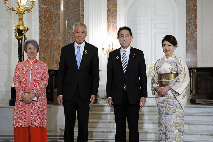 Japan ASEAN Special Summit Dinner at Geihinkan Prime Minister Fumio Kishida welcomes Singapore Prime Minister Lee Hsien Loong  center left  before the dinner. At right is his wife, Yuko, at the State Guest House in Moto Akasaka, Tokyo, at 7 p.m. on December 16, 2023  representative photo .