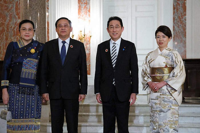 Japan ASEAN Special Summit Dinner at Geihinkan Prime Minister Fumio Kishida welcomes Laotian Prime Minister Sornsai Siphandong  center left  before the dinner. On the right is his wife, Yuko, at the State Guest House in Moto Akasaka, Tokyo, at 6:53 p.m. on December 16, 2023  Representative photo .