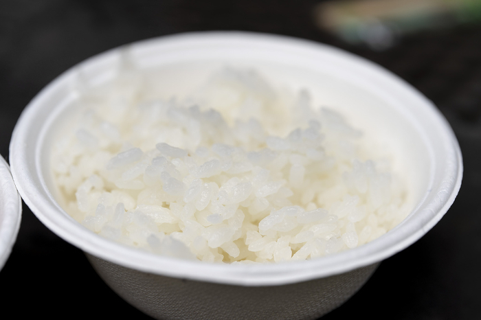 White rice served in a white styrofoam bowl