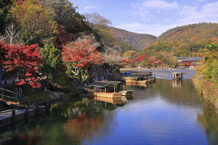 Houseboat cruising the autumn leaves of Arashiyama and the Katsura River, Kyoto 100 Best Places to View Autumn Foliage in Japan