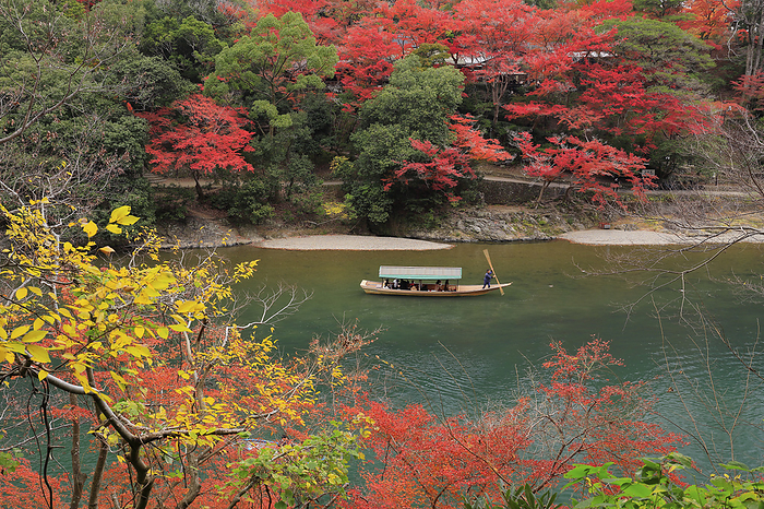 Arashiyama  Arashikyo  and Yakatabune  houseboat  in autumn leaves 100 Best Places to View Autumn Foliage in Japan