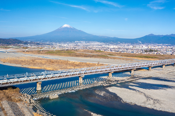 Tokaido Shinkansen crossing the Fuji River with Mt.