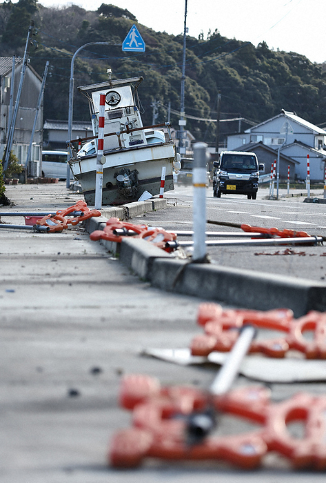 Major Earthquake of Magnitude 7 in Noto District, Nanao City, Ishikawa Prefecture A fishing boat washed up on the road by the tsunami caused by the earthquake in Nanao City, Ishikawa Prefecture, Japan, at 1:29 p.m. on January 4, 2024  photo by Tatsuro Tamaki .