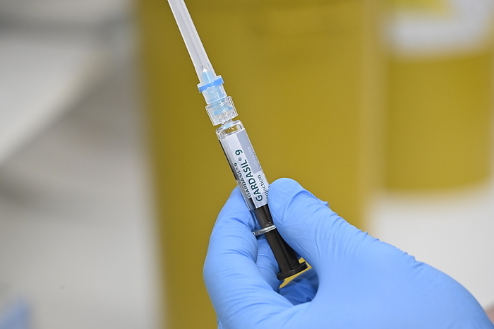 Gardasil cervical cancer vaccine Syringe containing the Gardasil cervical cancer vaccine. This vaccine protects against nine types of the human papillomavirus  HPV . HPV causes a number of cancers, including cervical and penile cancers, and genital warts., by DR P. MARAZZI SCIENCE PHOTO LIBRARY