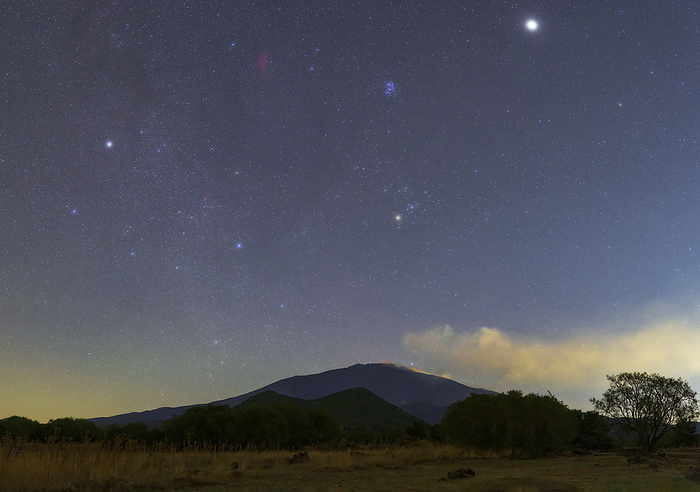 Rising stars over Mount Etna, Sicily, Italy Taurus and Auriga constellations rising over mount Etna, Sicily, Italy. The Pleiades star cluster and California nebula can be seen at top centre. Jupiter is the brightest point in the image at top right., by AMIRREZA KAMKAR   SCIENCE PHOTO LIBRARY