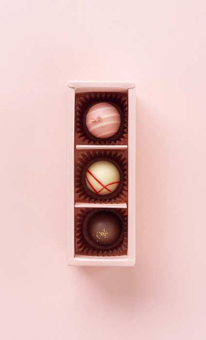 Chocolate Gifts on Pink Background