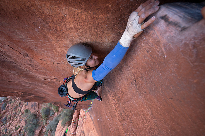 Desert Rock Climbing Woman Near Las Vegas, by Cavan Images / Vultaggio Studios