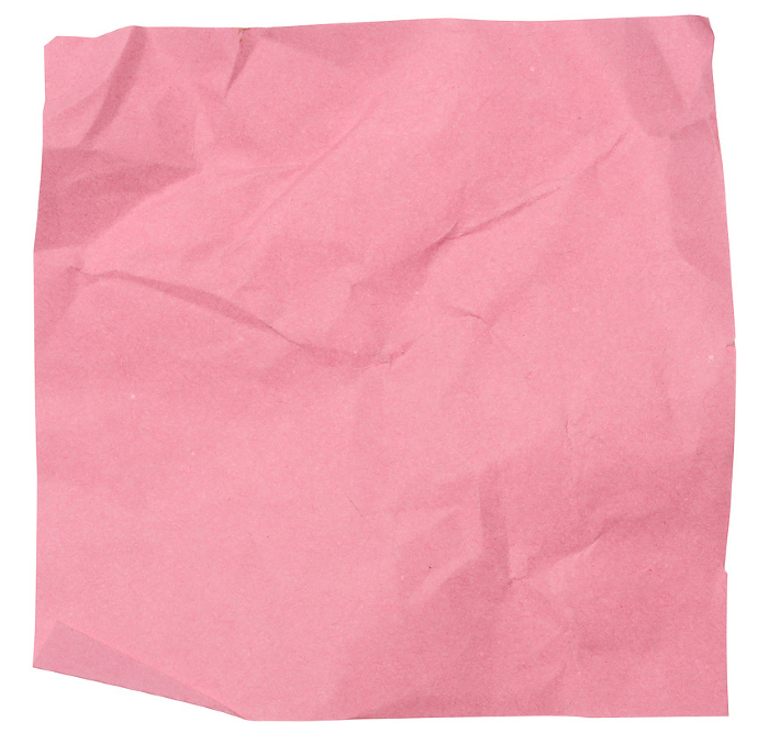 Crumpled pink sheet of paper on white isolated background, sticky note Crumpled pink sheet of paper on white isolated background, sticky note