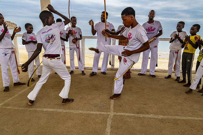 Young boys practising Capoeira, Baia Azul, Benguela, Angola, Africa Young boys practising Capoeira, Baia Azul, Benguela, Angola, Africa, by Michael Runkel
