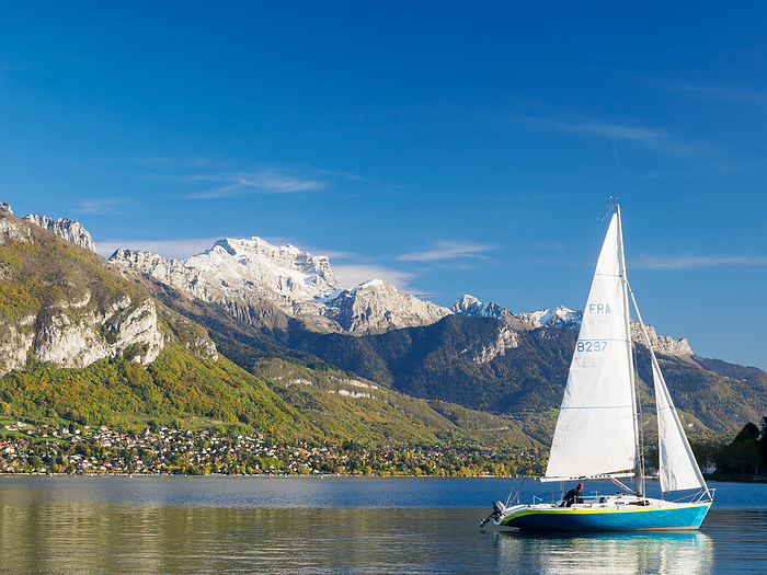 A sailboat on Lake Annecy on a beautiful late fall day, Annecy, Haute Savoie, France, Europe A sailboat on Lake Annecy on a beautiful late fall day, Annecy, Haute Savoie, France, Europe, by Melissa Kuhnell