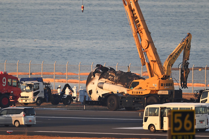 Removal of Japan Coast Guard aircraft MA722 and JAL A350 from Runway C at Haneda Airport JAL s Airbus A350 900  JL516 from Sapporo Shin Chitose to Haneda, reg. JA13XJ  engine Rolls Royce Trent XWB being removed from Runway C at Haneda Airport, on January 6, 2024. PHOTO: Tadayuki YOSHIKAWA Aviation Wire