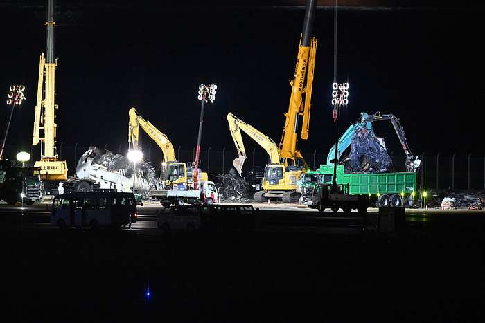 Removal of Japan Coast Guard aircraft MA722 and JAL A350 from Runway C at Haneda Airport JAL s Airbus A350 900  JL516 from Sapporo Shin Chitose to Haneda, reg. JA13XJ  fuselage and engine Rolls Royce Trent XWB being removed from Runway C at Haneda Airport, on January 6, 2024. PHOTO: Tadayuki YOSHIKAWA Aviation Wire