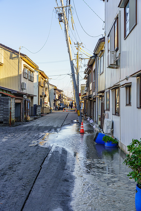 Japan Earthquake A general view of a damaged road caused by liquefaction in Imizu, Toyama Prefecture, Japan, January 2, 2024. A powerful magnitude 7.6 earthquake hit Japan s Noto Peninsula of Ishikawa Prefecture on New Year s Day, Monday, January 1, 2024.   Photo by AFLO 