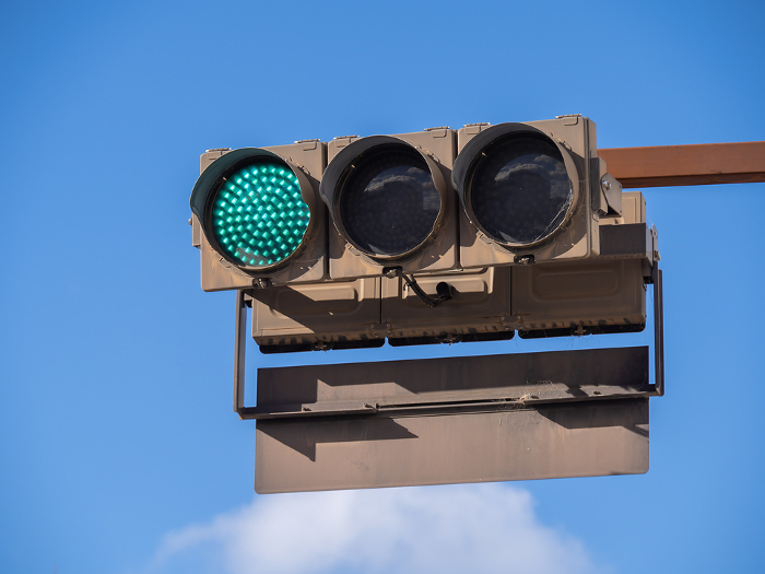 A traffic light with blue lights.