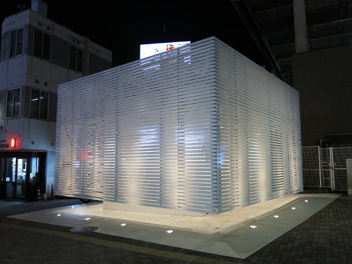 Public toilets at the west exit of Ebisu Station (THE TOKYO TOILET) at night when lit up