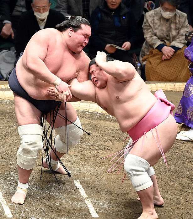 Sumo Tournament, 1st day of the 1st Grand Sumo Tournament Terunofuji locking arms with Ura  right  on January 14, 2024 date 20240114 place Ryogoku Kokugikan