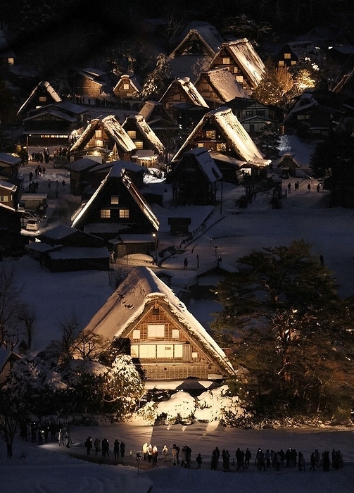 Illuminated gassho house in Shirakawa go Gassho houses in Shirakawa go, which are lit up fantastically, in Shirakawa Village, Gifu Prefecture, Japan, at 5:39 p.m. on January 14, 2024.