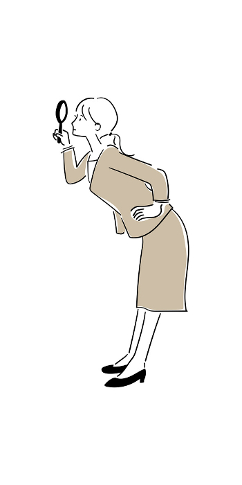 Businesswoman carefully checking with a magnifying glass