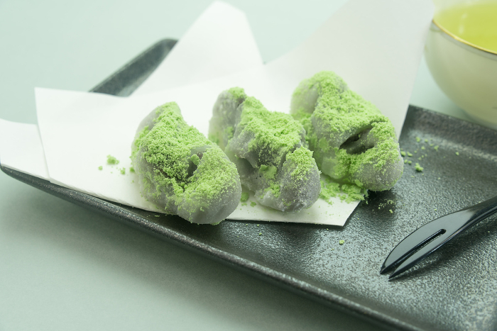 mochi filled with red bean paste and topped with green soy flour