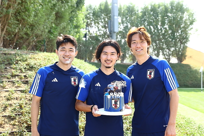 AFC Asian Cup Qatar 2023 Japan training session Japan s Takumi Minamino  C  is celebrated his 29th birthday by Yukinari Sugawara  L  and Ko Itakura during a training session in Doha, Qatar, January 16, 2024.  Photo by JFA AFLO 