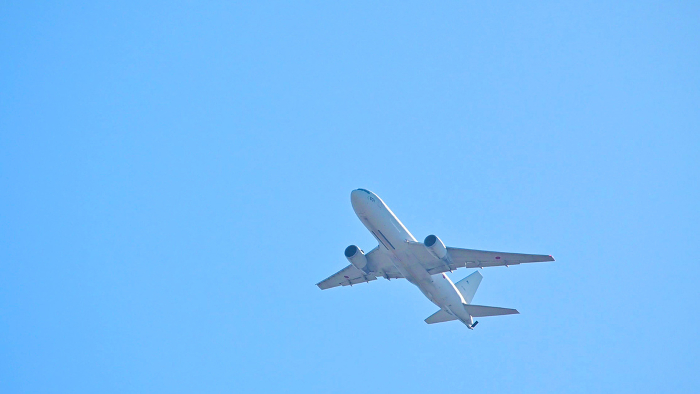 Jet airliner flying in the blue sky