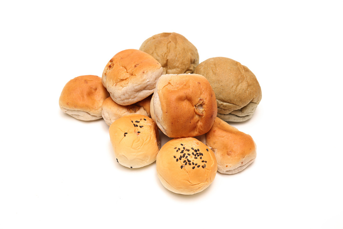Various breads on white background