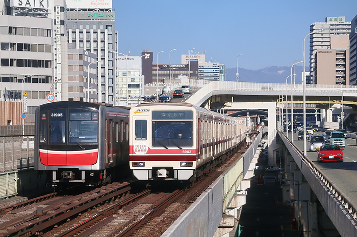 Osaka Metro and Kita Osaka Kyuko trains on Midosuji Line pass each other Osaka Pref. Shin Osaka Station   Nishinakajima Minamikata Station