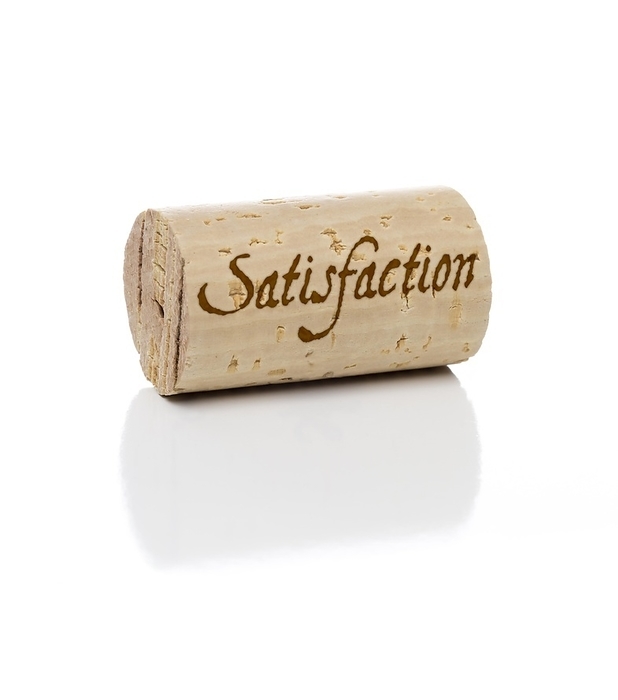 Satisfaction branded wine cork isolated on a white background