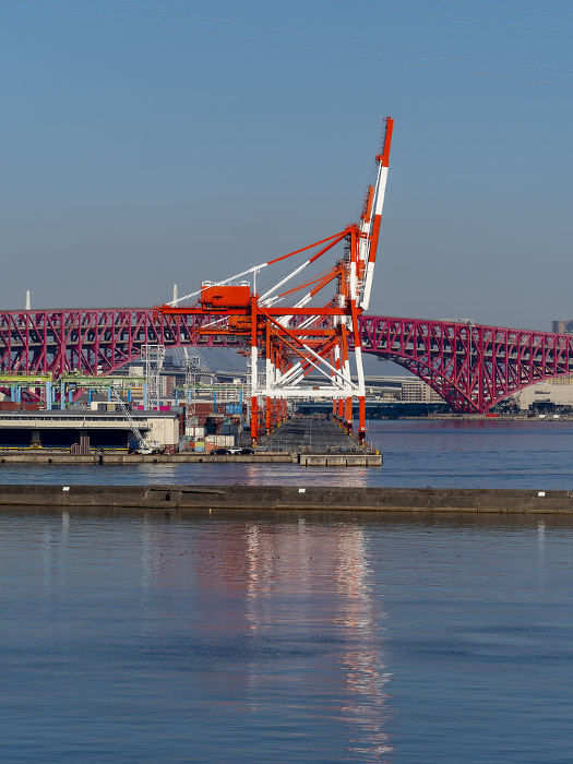 Gantry cranes at the Port of Osaka and the Port Bridge
