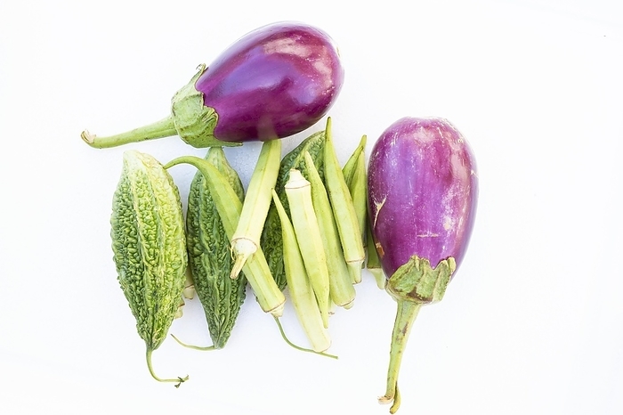 Okra (Abelmoschus esculentus), Eggplant (Solanum melongena) and Bitter melon (Momordica charantia) isolated on white background