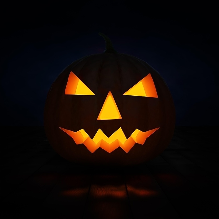 Halloween concept design background, scary Jack-o'-lantern carved pumpkin with candle light inside