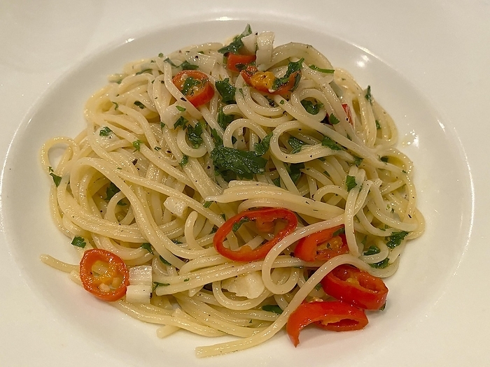 Plate of spaghetti aglio, olio e peperoncino, with garlic, oil and chilli, Baden-Württemberg, Germany, Europe