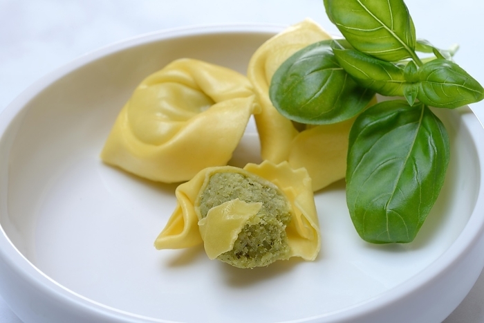 Tortelloni with basil pesto filling, opened, pasta, pasta products