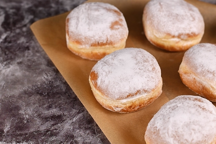 Berliner Pfannkuchen, a traditional German donut like dessert filled with jam made from sweet yeast dough fried in fat