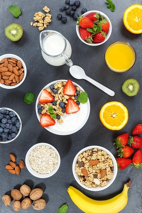 Strawberry yogurt food spoon cereal fruit yogurt breakfast healthy diet slate in germany