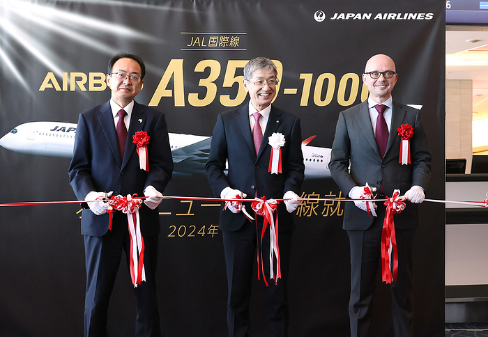Japan Airlies  JAL  launches Airbus A350 1000 for its New York route January 24, 2024, Tokyo, Japan     R L  Airbus Japan president StephaneGinoux, Japan Airlines  JAL  president Yuji Akasaka and Land, Infrastructure and Transport Ministry Deputy Director General Toshyuki Onuma cut a ribbon for JAL s first flight of the Airbus A350 1000 which flies to New York at the Haneda airport in Tokyo on Wednesday, January 24, 2024. JAL received two Airbis A350 1000 next generation jetliners last month.    photo by Yoshio Tsunoda AFLO 