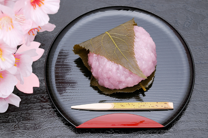 rice cake with bean paste wrapped in a preserved cherry leaf