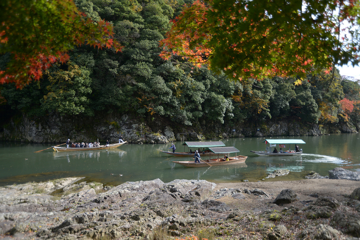 Arashiyama Gorge in Autumn Houseboat and Hozu River cruise boat Ukyo-ku, Kyoto