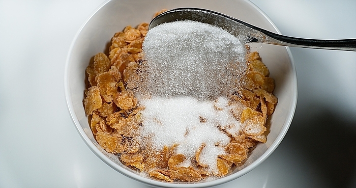 Sugar Poured on a Bowl of Cereals, by Lacz Gerard