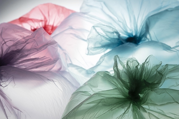 Assortment different colored plastic bags, by Oleksandr Latkun